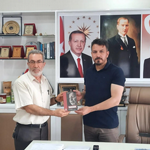 Erbakan'ın kitabı DAVAM'ı hediye eti